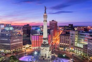 Indianapolis, Indiana, USA skyline over Monument Circle at dusk.